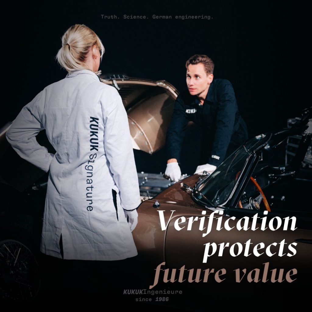 Engineers inspecting and verifying the car